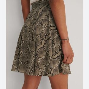attention snake skin skirt size large